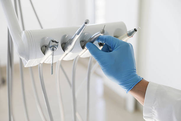 Professional Tooth Extraction technician working in Maumelle, AR